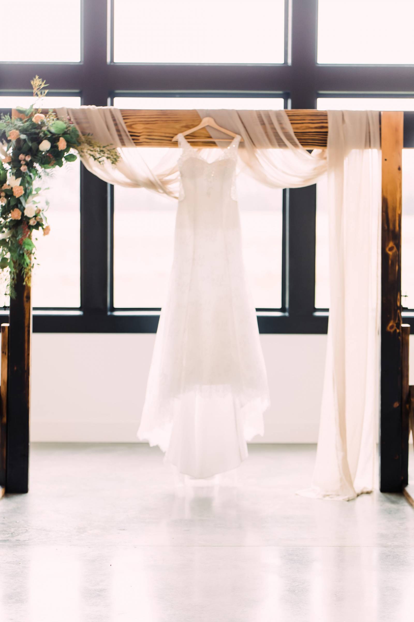 wooden ceremony arch with fabric