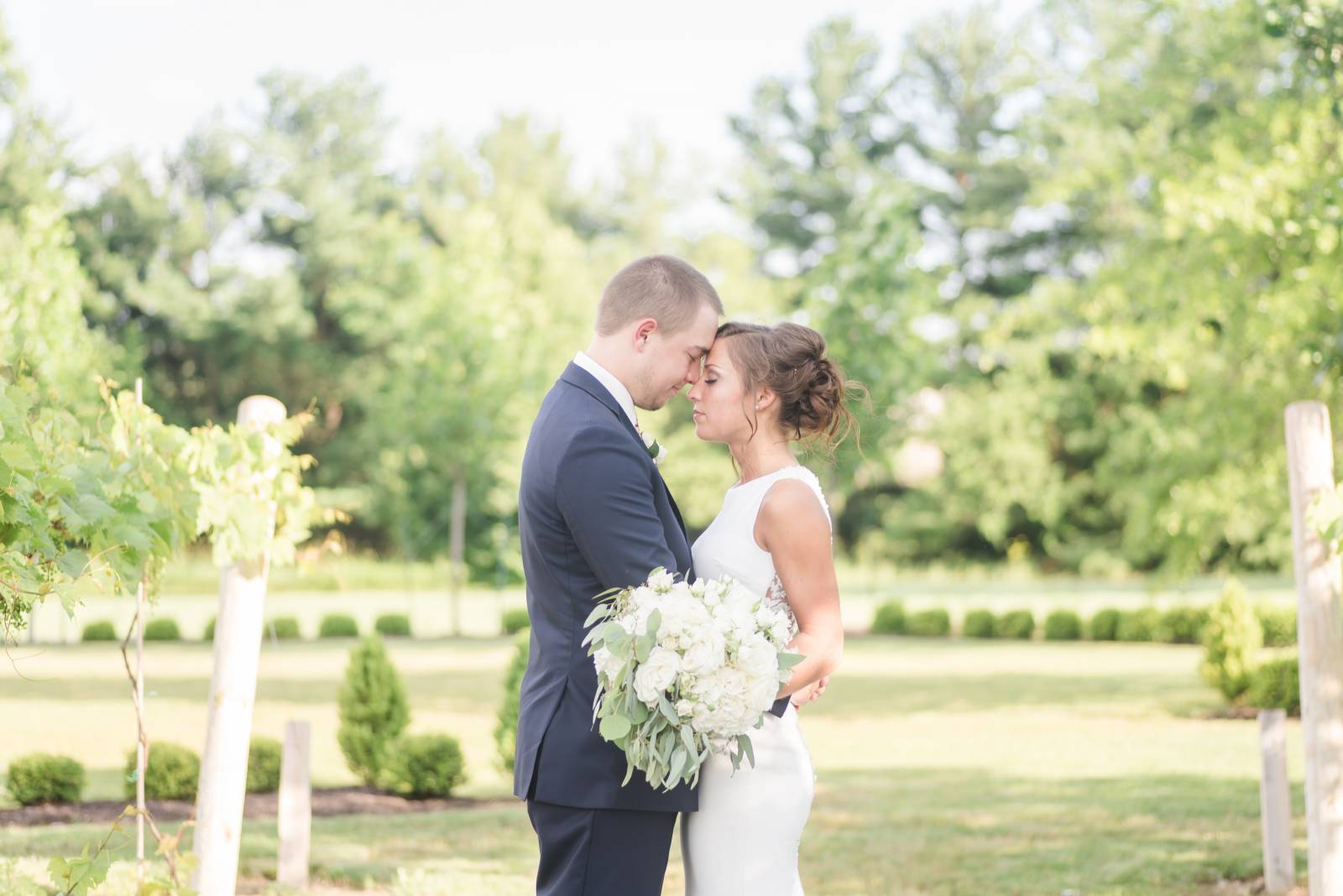 bride and groom in a vineyard